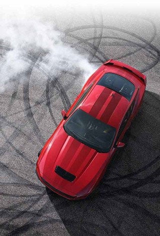 Overhead view of a 2024 Ford Mustang® model with tire tracks on pavement | Tubbs Brothers Ford Inc in Sandusky MI