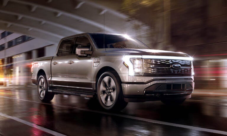 2023 Ford F-150 Lightning in a night scene