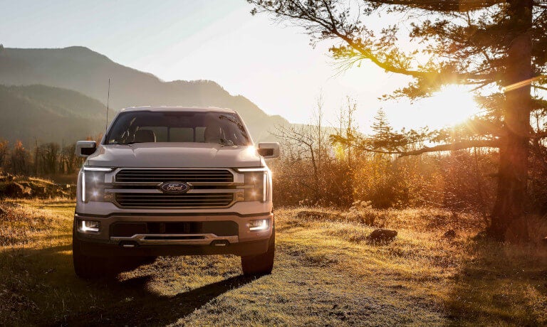2024 Ford F-150 alongside a sunrise theme